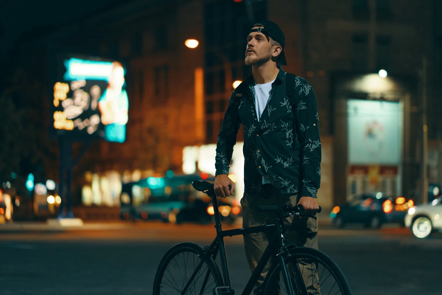 person looking at somwhere on the road